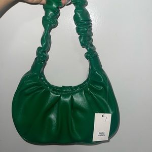 Affordable green leather purse, suitable for a date night or party night etc..